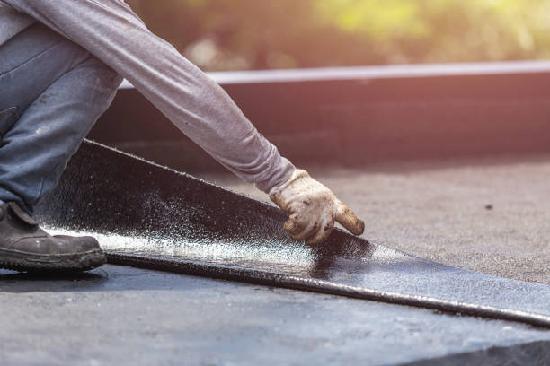 Professional Waterproofing technician working in Ellettsville, IN